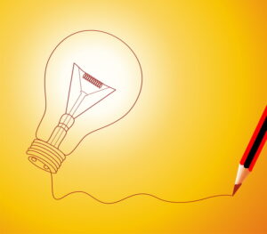 drawing-of-a-lightbulb-on-yellow-background